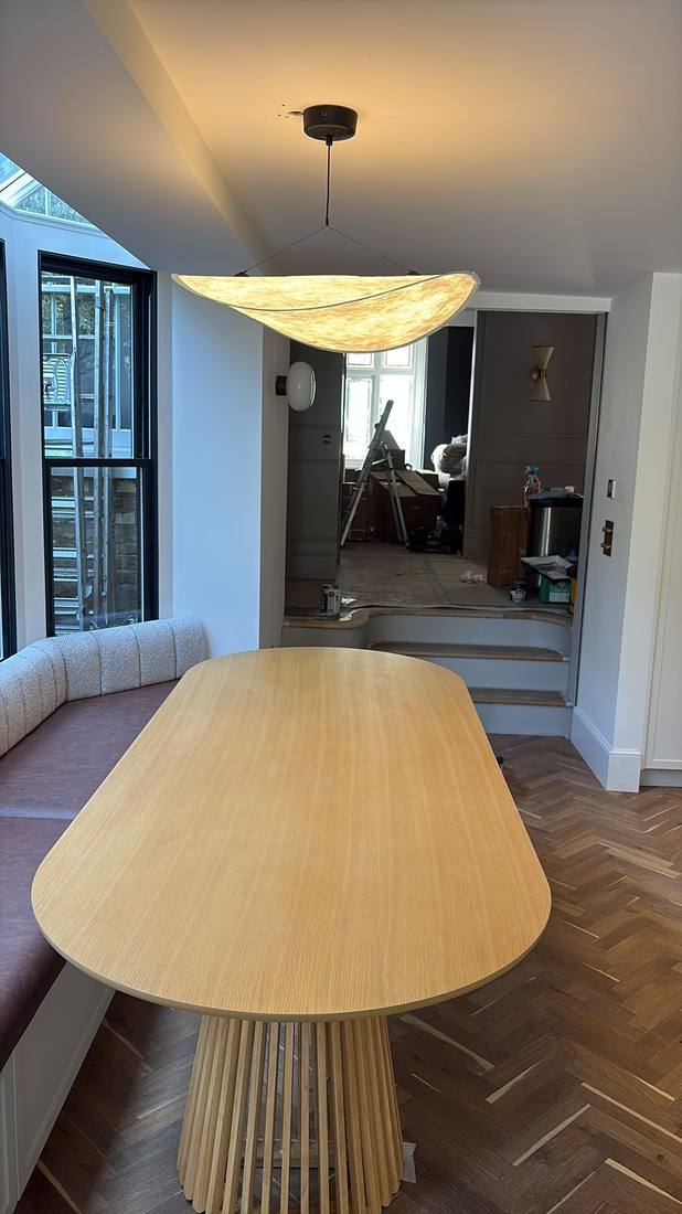 Dining Room with Leaf-Shaped Pendant