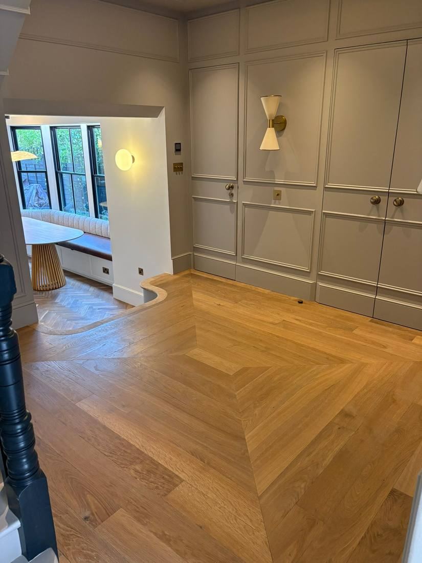 Grand Hallway with Herringbone & Curved Steps