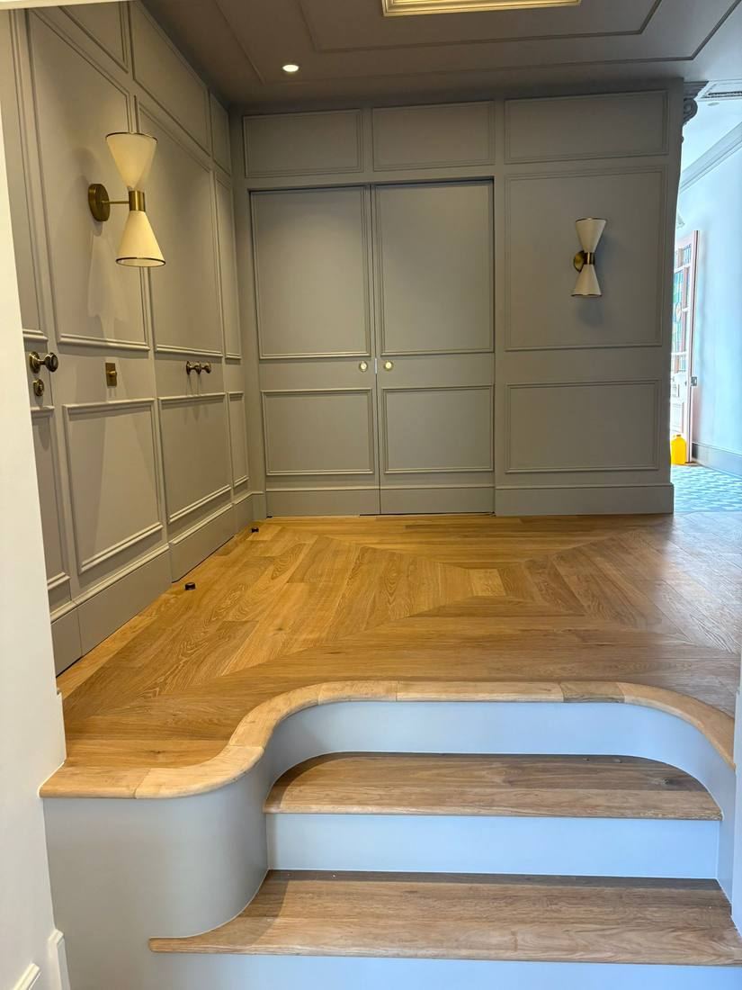 Panelled Hallway with Curved Oak Platform